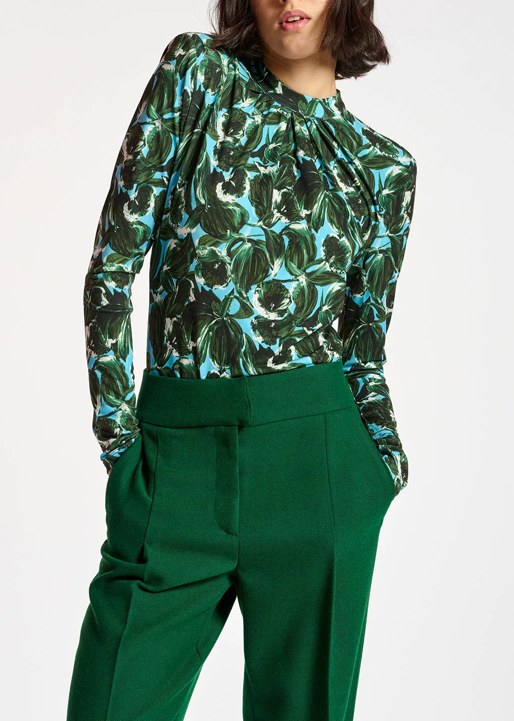 Blue and dark green leaf-print mock neck top